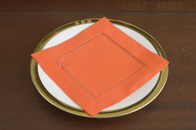 Solid colored hemstitch cocktail napkin 6". Scarlet Ibis color